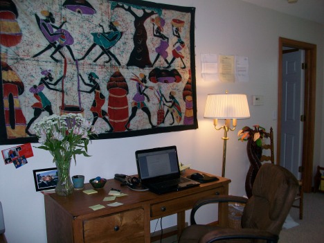 My writing space: Centered by an African batik.